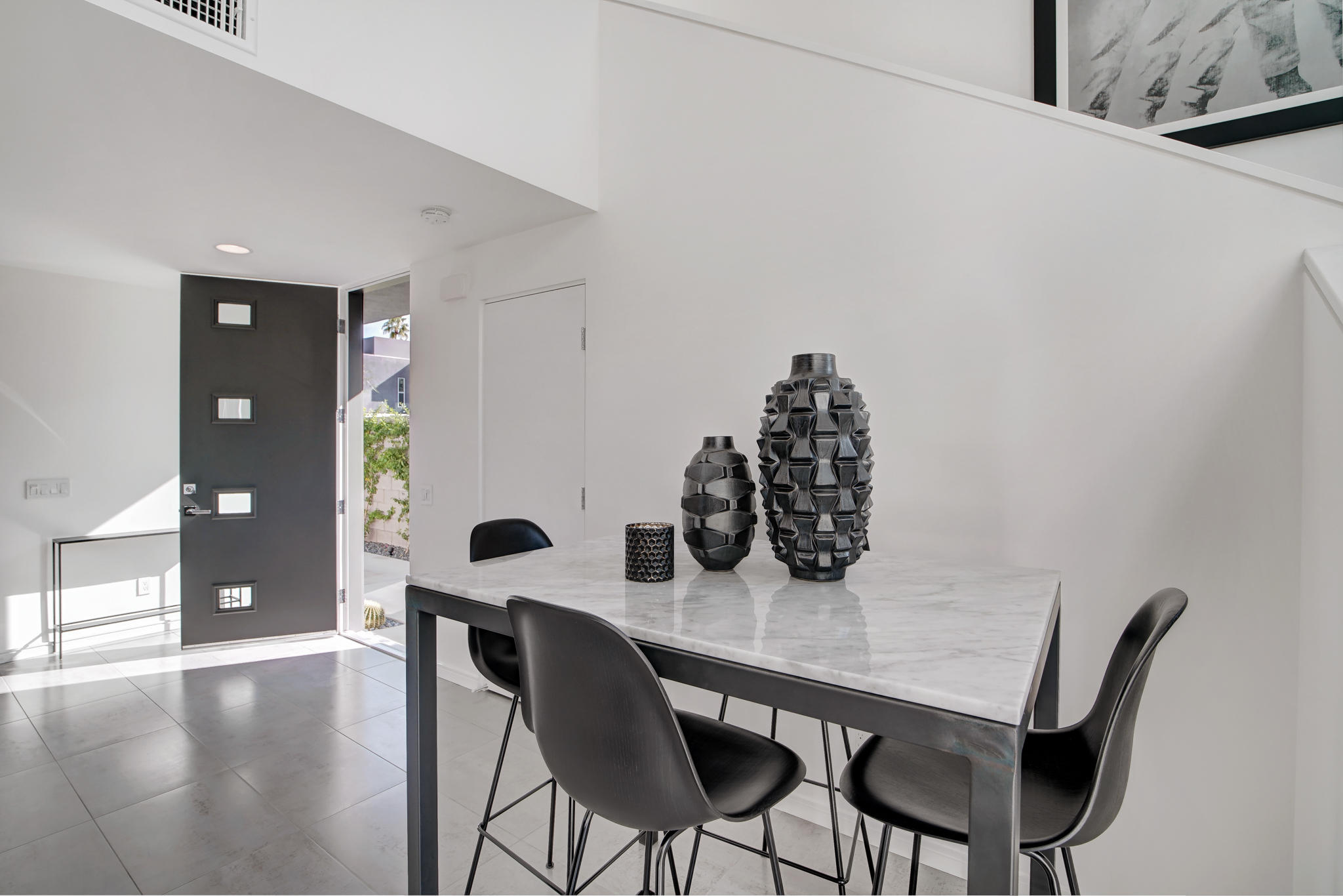 305 Goleta Way Palm Springs, CA 92264 - Photo 13 of 34 a dining room with furniture and wooden floor