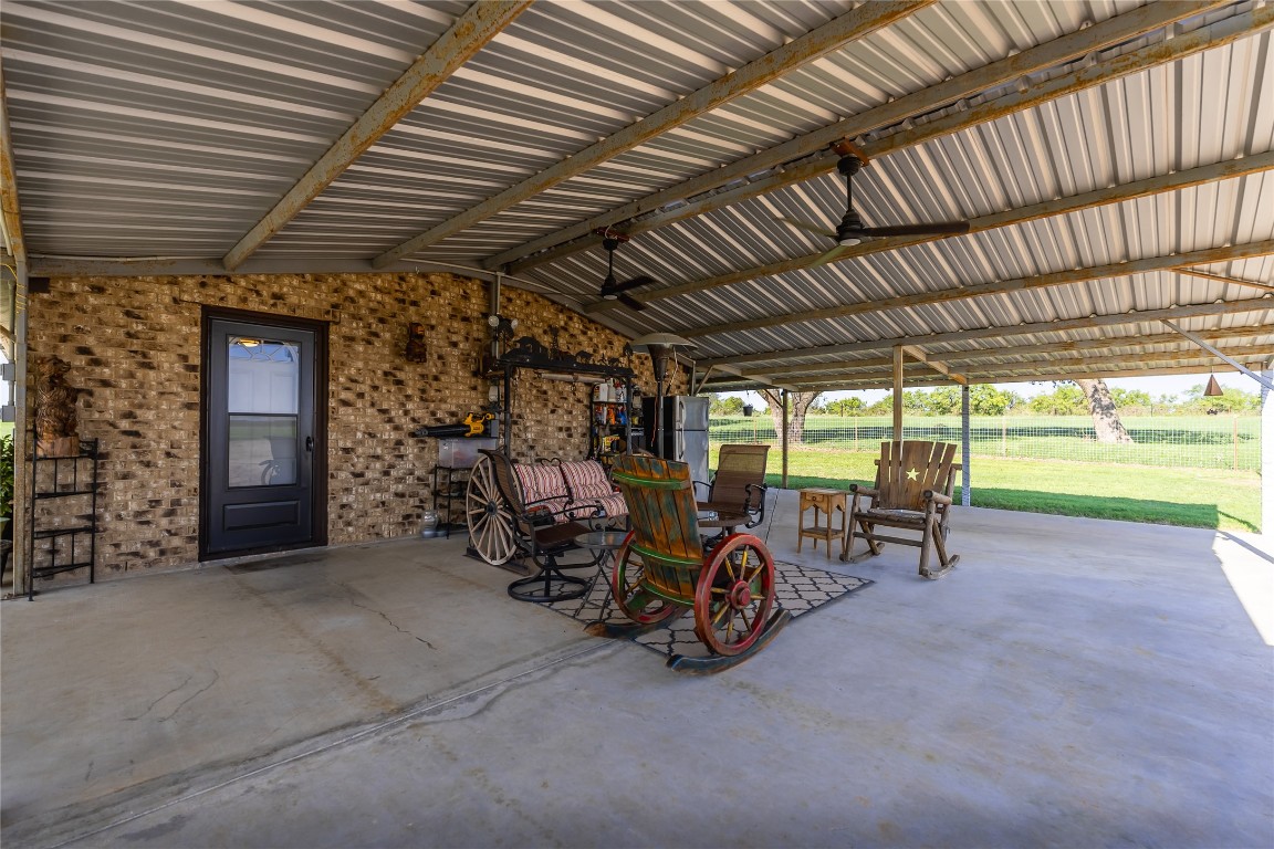 1483 County Road 255 Rochelle, TX 76872 - Photo 20 of 33 a view of a room with chairs and table in the patio