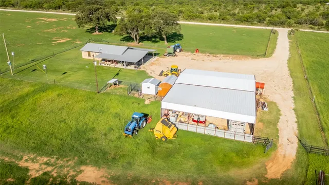 a view of swimming pool with a garden and deck