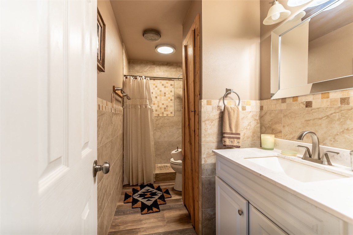 1483 County Road 255 Rochelle, TX 76872 - Photo 10 of 33 a bathroom with a sink and a mirror