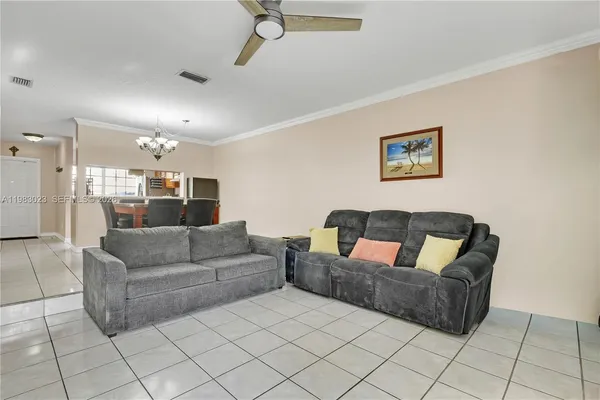 a living room with furniture and a couch