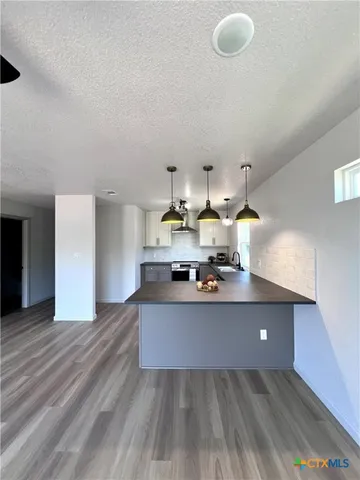 a view of kitchen and sink