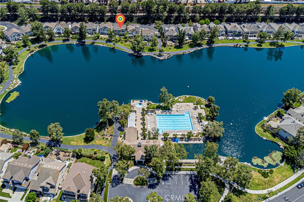 106 Lakeside Drive Buena Park, CA 90621 - Photo 3 of 3 an aerial view of a house with a lake view