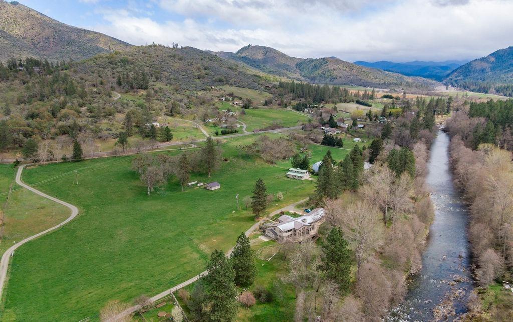 2076 Upper Applegate Road Jacksonville, OR 97530 - Photo 1 of 35 a view of a lush green hillside and houses