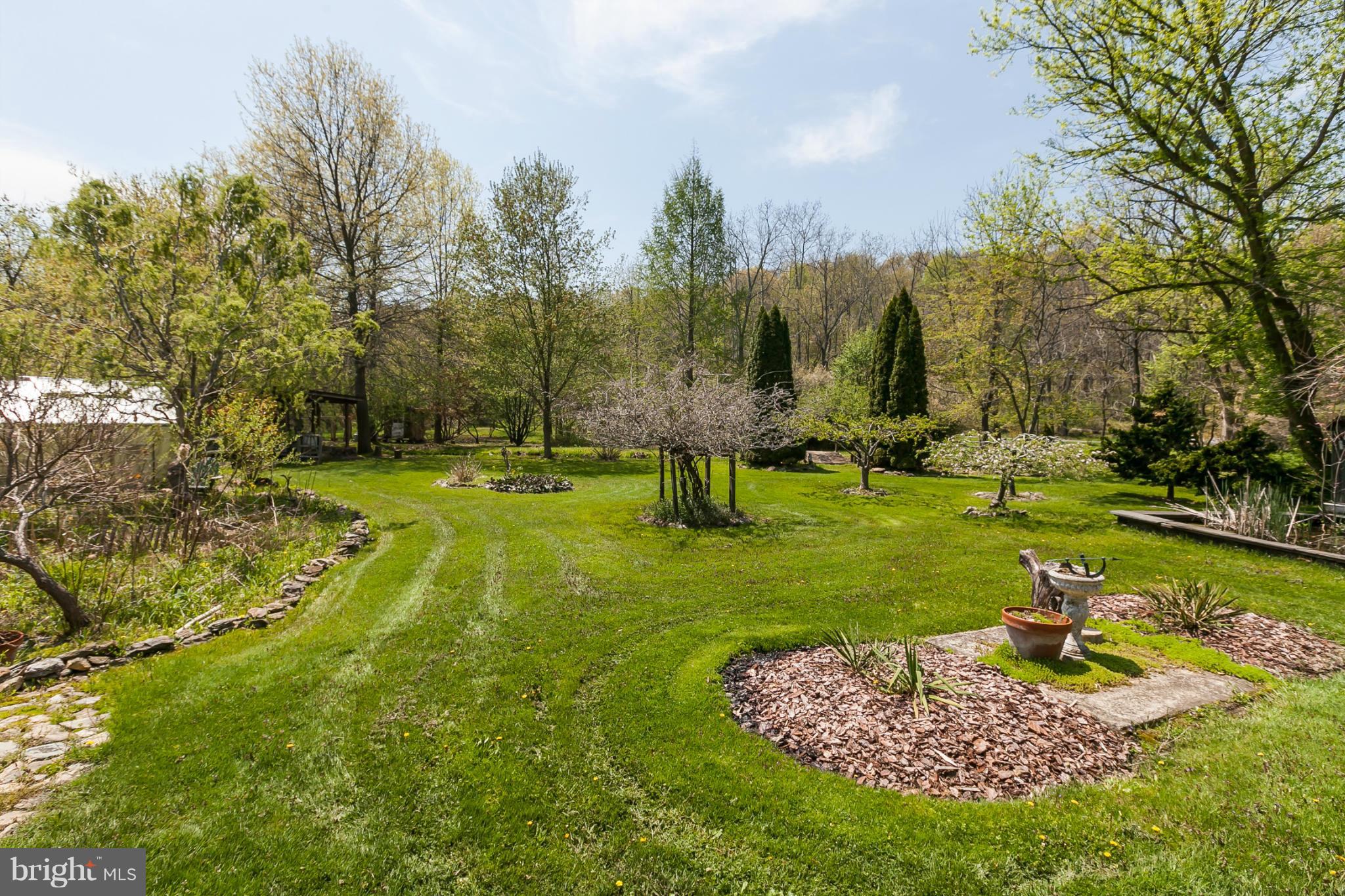 21421 Heathcote Road Freeland, MD 21053 - Photo 22 of 29 a view of a park with large trees