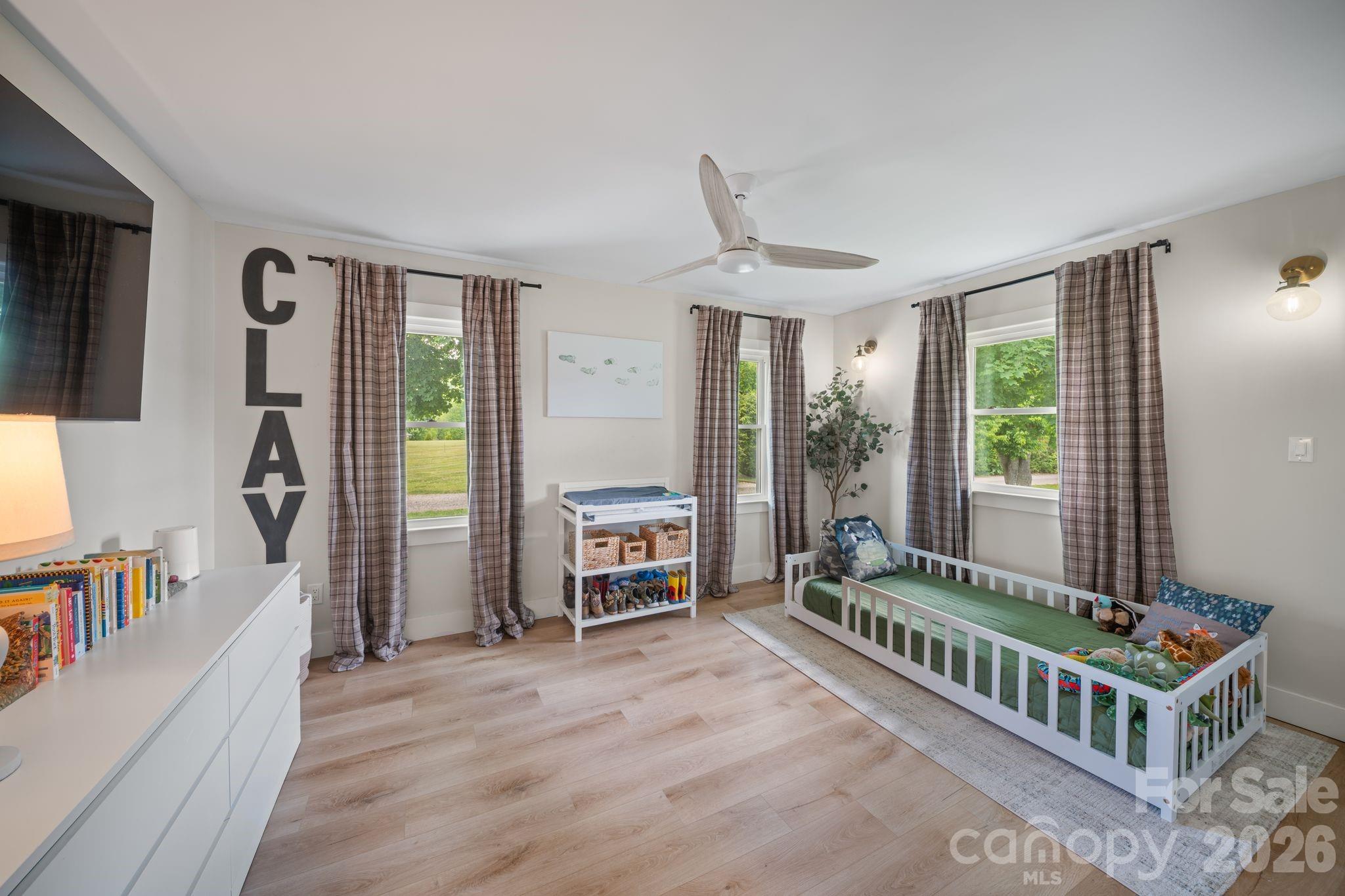 97 Paul Holland Road Canton, NC 28716 - Photo 28 of 35 a room with furniture and a window