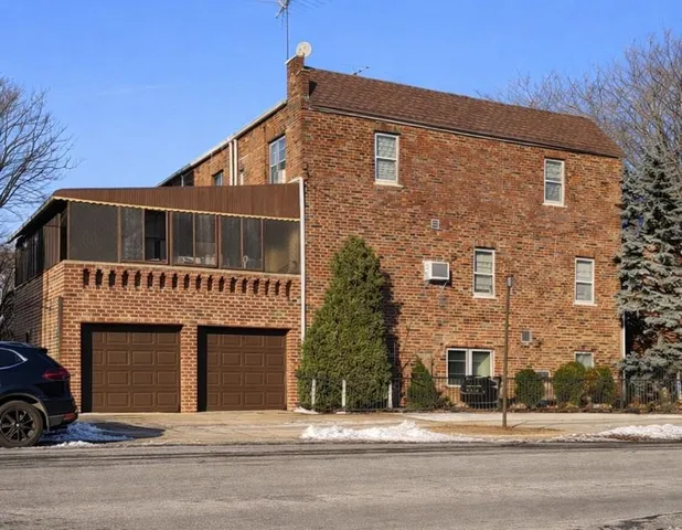 a view of a building with a street