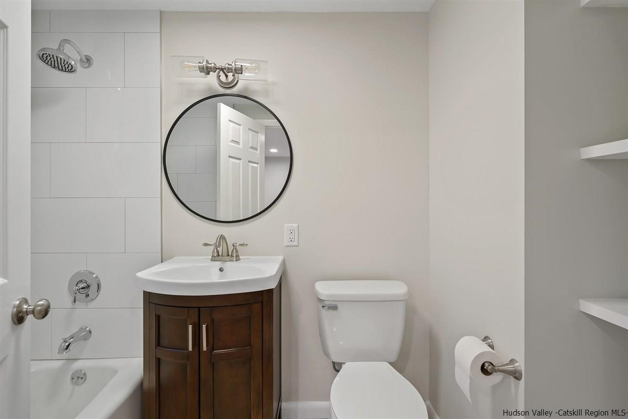 432 Plattekill Ardonia Road Wallkill, NY 12589 - Photo 15 of 35 a bathroom with a sink and a mirror