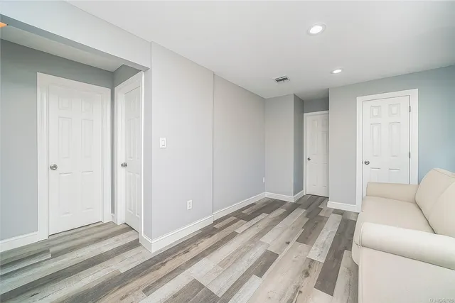 a room with a bed and a window