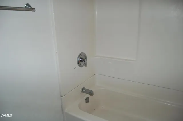 an empty room with closet