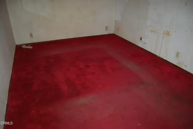 a bathroom with a shower and a toilet