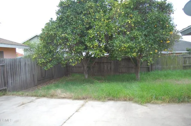 a stove top oven sitting inside of a kitchen