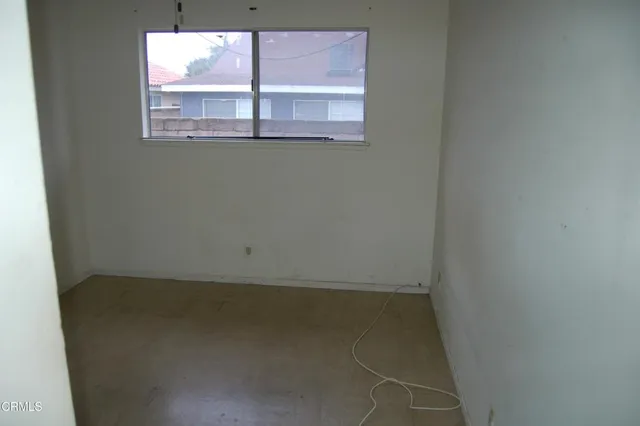 an empty room with a window