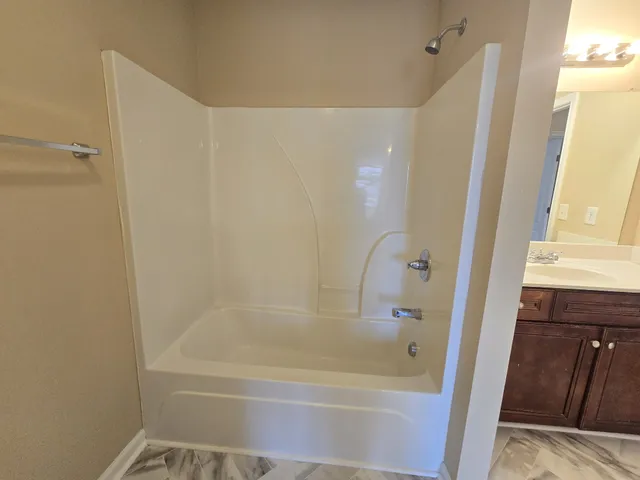a bathroom with a bathtub