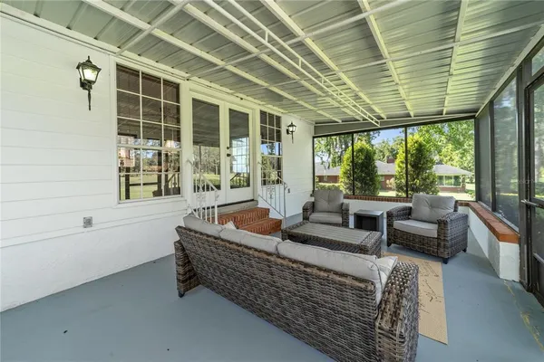 a outdoor living space with furniture and garden view