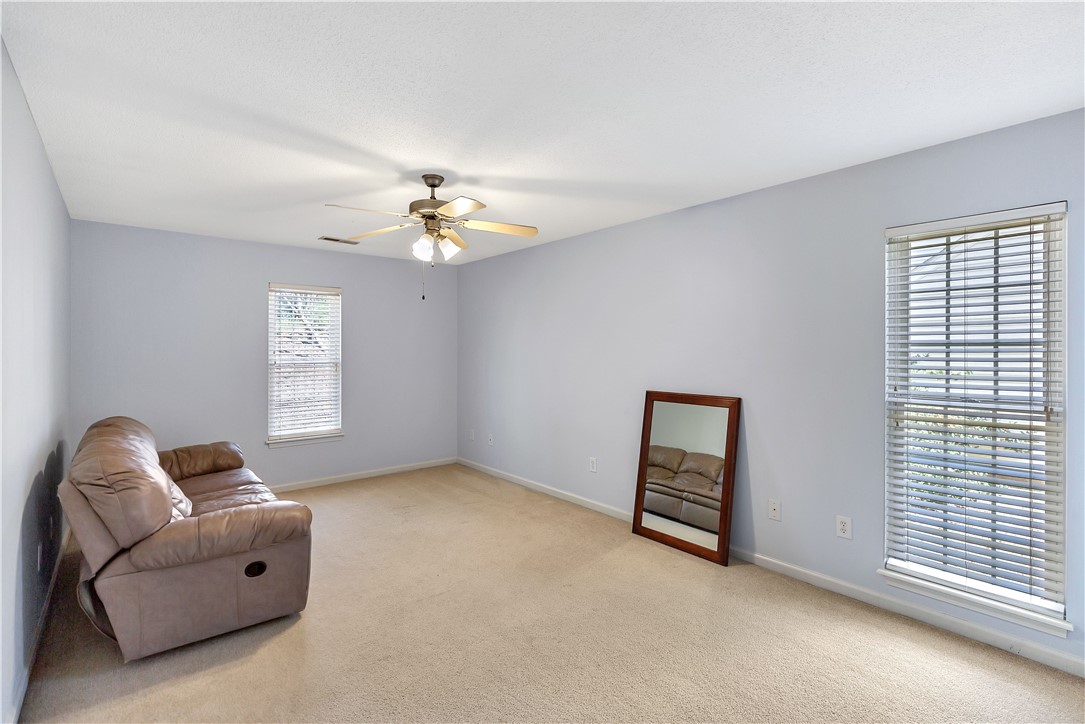 256 Rock Creek Road Clemson, SC 29631 - Photo 16 of 30 The primary bedroom, located on the main floor has an adjoining bath, closet and access to the laundry room.
