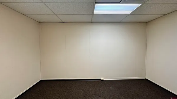an empty room with a door