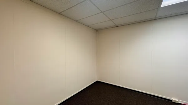 an empty room with a door