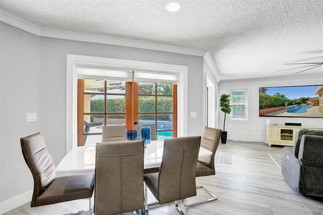 a spacious bathroom with a granite countertop sink and a large mirror