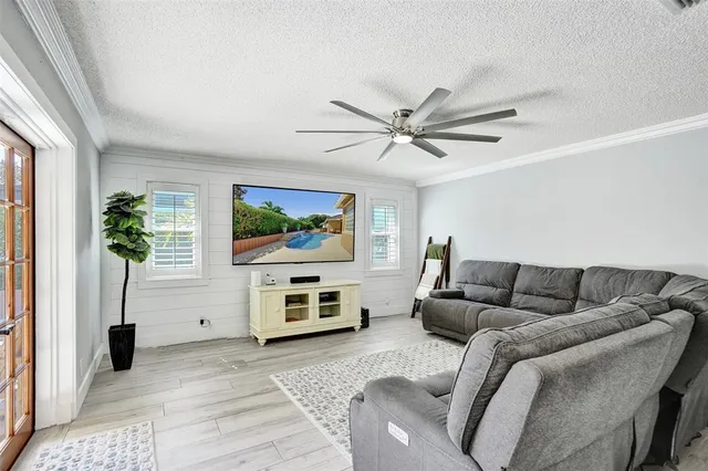 a bathroom with a shower and a sink