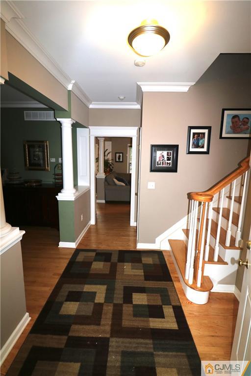 70 Willow Road Metuchen, NJ 08840 - Photo 3 of 25 a living room with furniture and a rug