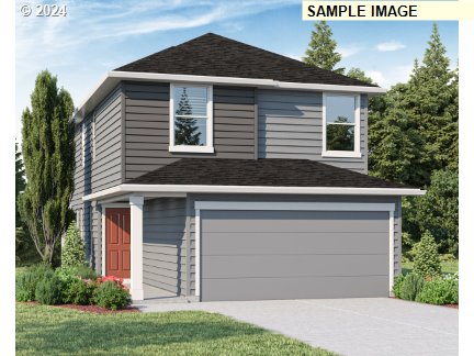 819 Northwest 175th Way Ridgefield, WA 98642 - Photo 1 of 26 a front view of a house with a yard and garage