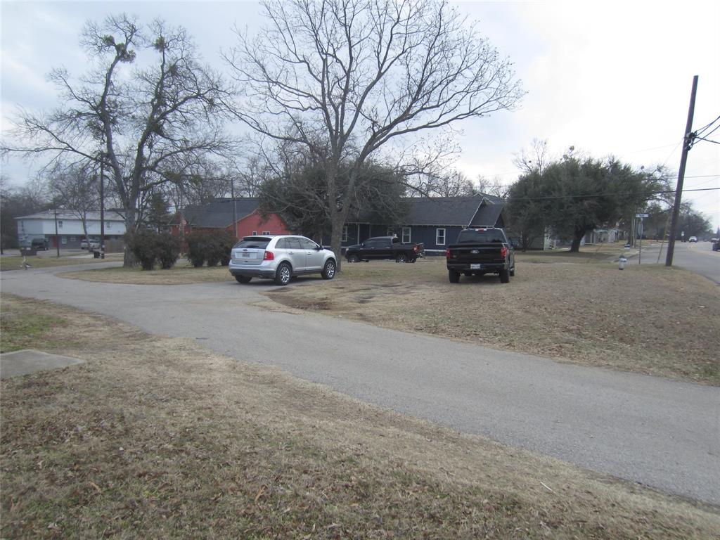 1004 Church Street Sulphur Springs, TX 75482 - Photo 12 of 38 a view of street with parked cars