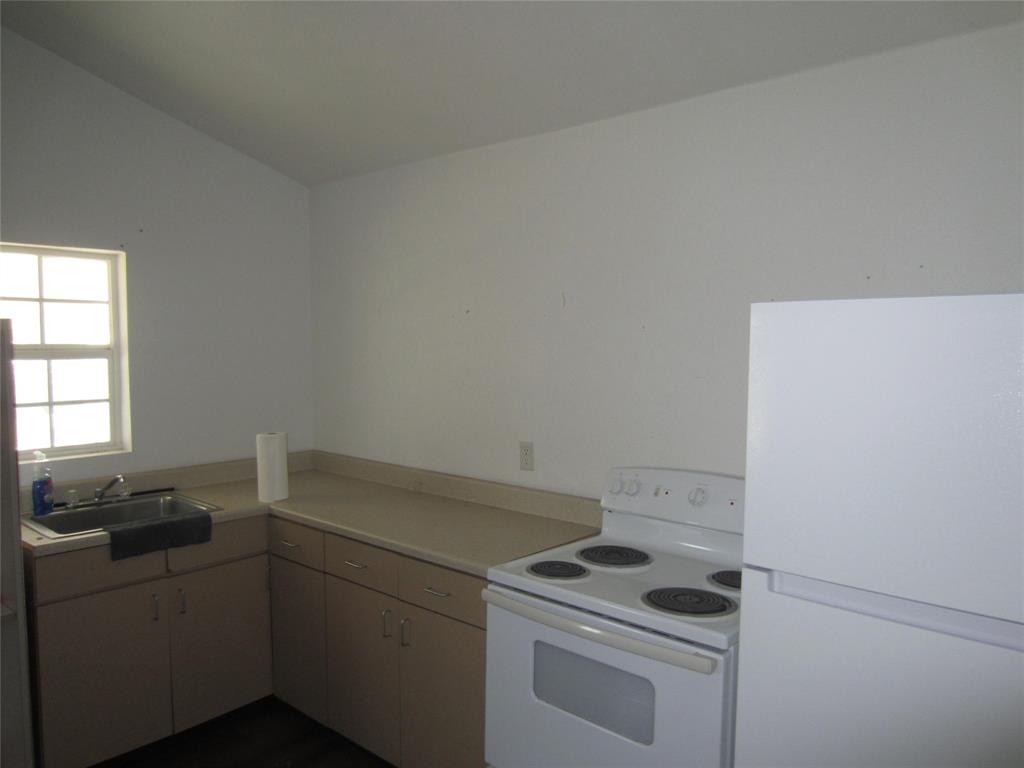 1004 Church Street Sulphur Springs, TX 75482 - Photo 30 of 38 a room with storage and utility