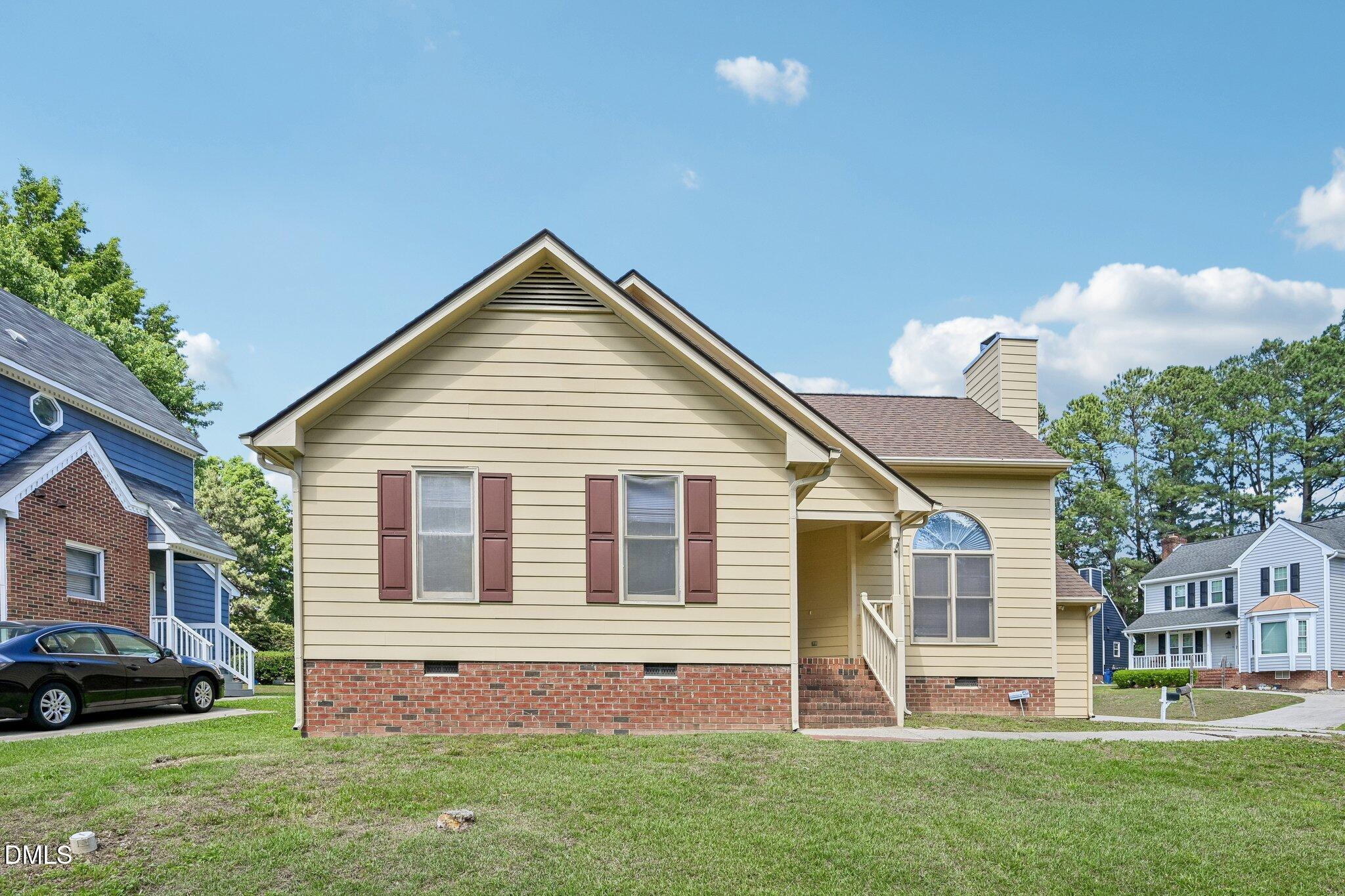 2800 West Jameson Road Raleigh, NC 27604 - Photo 1 of 24 a view of a house with a yard