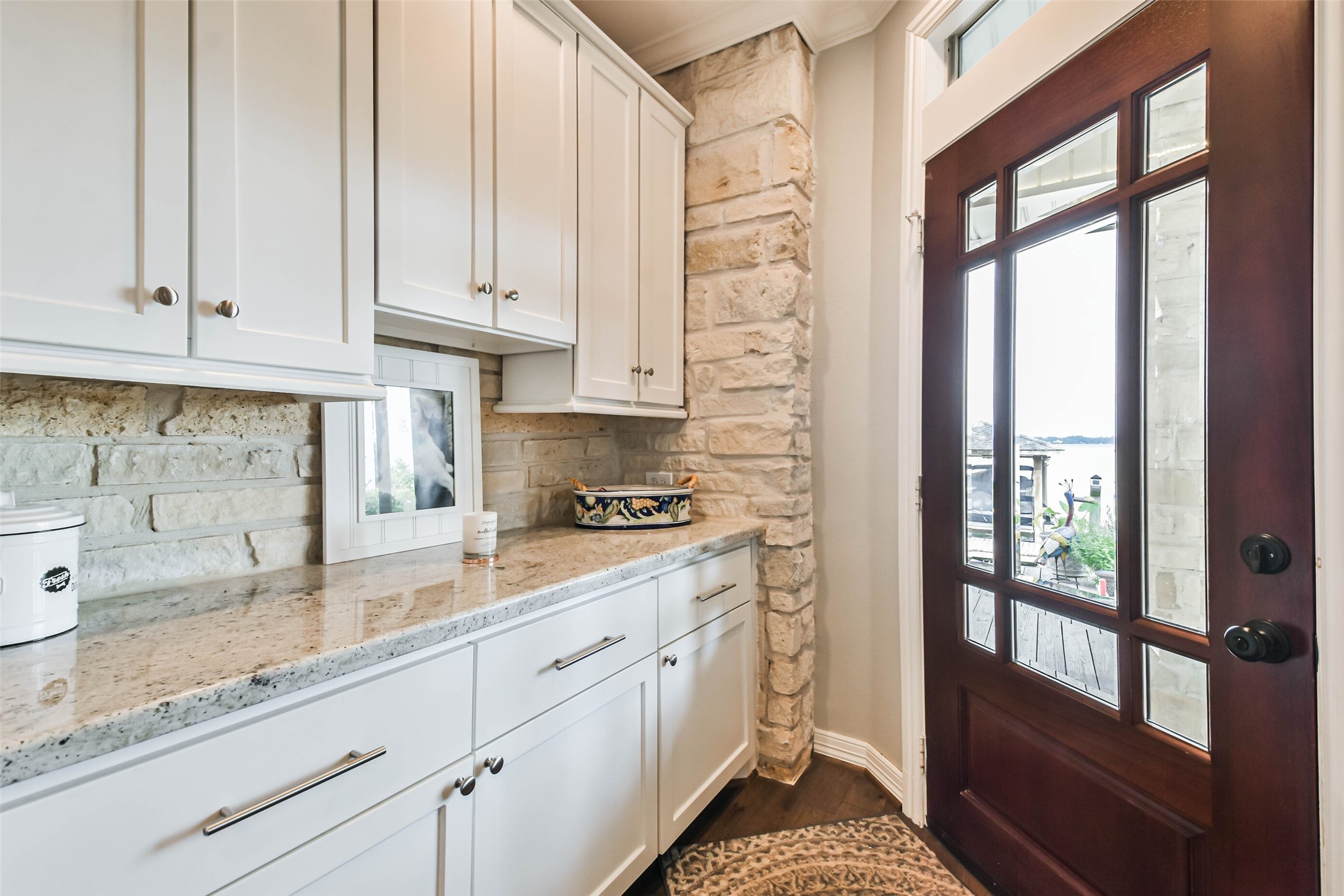 19022 Vantage View Lane Houston, TX 77346 - Photo 18 of 38 a kitchen with granite countertop white cabinets and white appliances