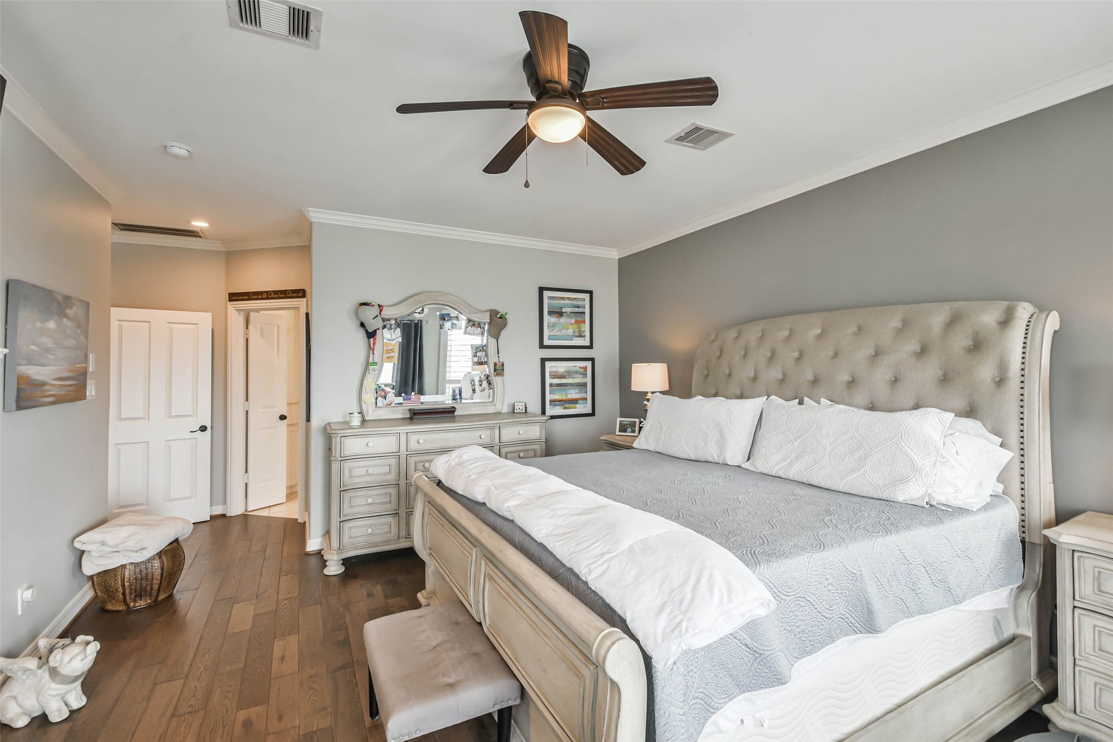 19022 Vantage View Lane Houston, TX 77346 - Photo 20 of 38 a bedroom with a bed and ceiling fan