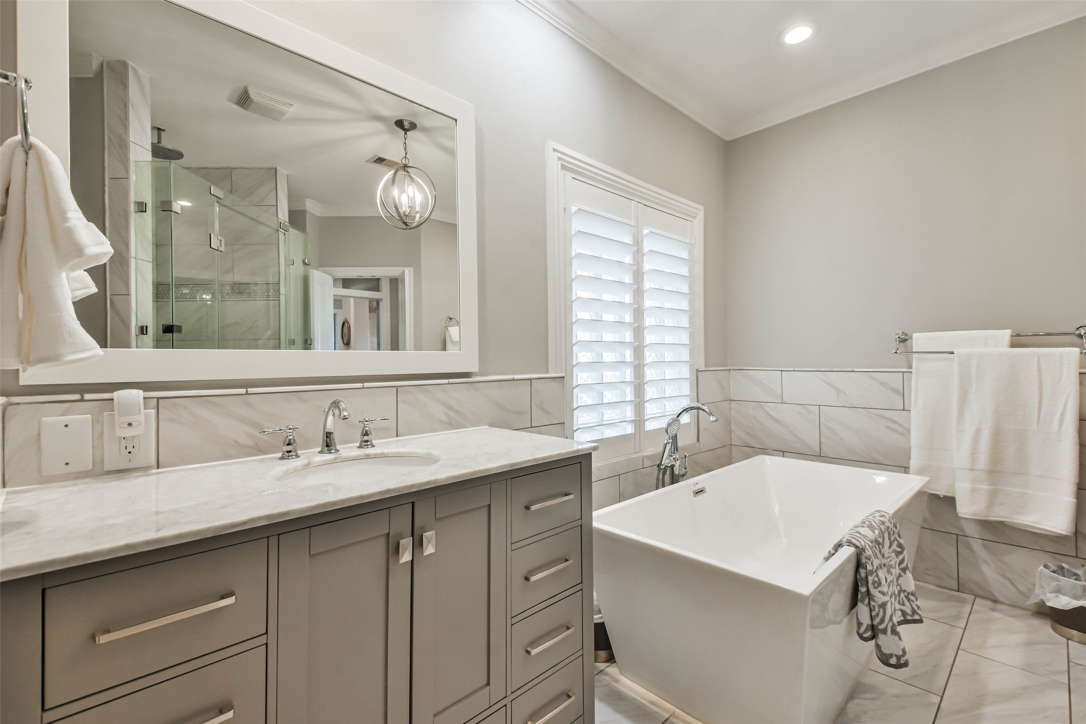19022 Vantage View Lane Houston, TX 77346 - Photo 22 of 38 a bathroom with a sink double vanity and a mirror
