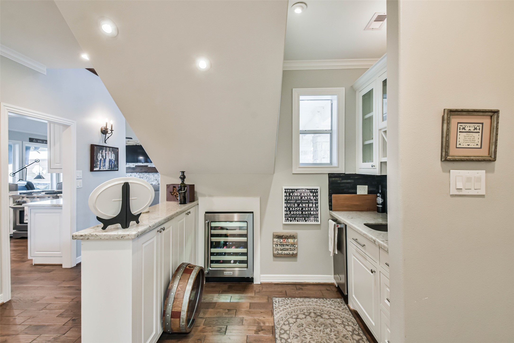 19022 Vantage View Lane Houston, TX 77346 - Photo 27 of 38 a kitchen with stainless steel appliances a stove top oven a sink a refrigerator and cabinets