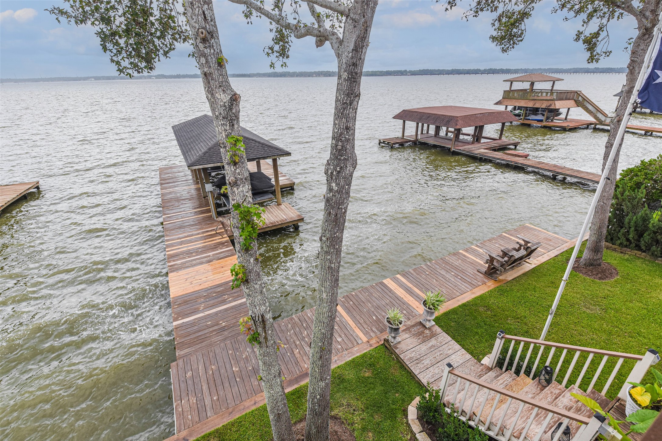 19022 Vantage View Lane Houston, TX 77346 - Photo 3 of 38 a view of a wooden deck and a patio with swimming pool