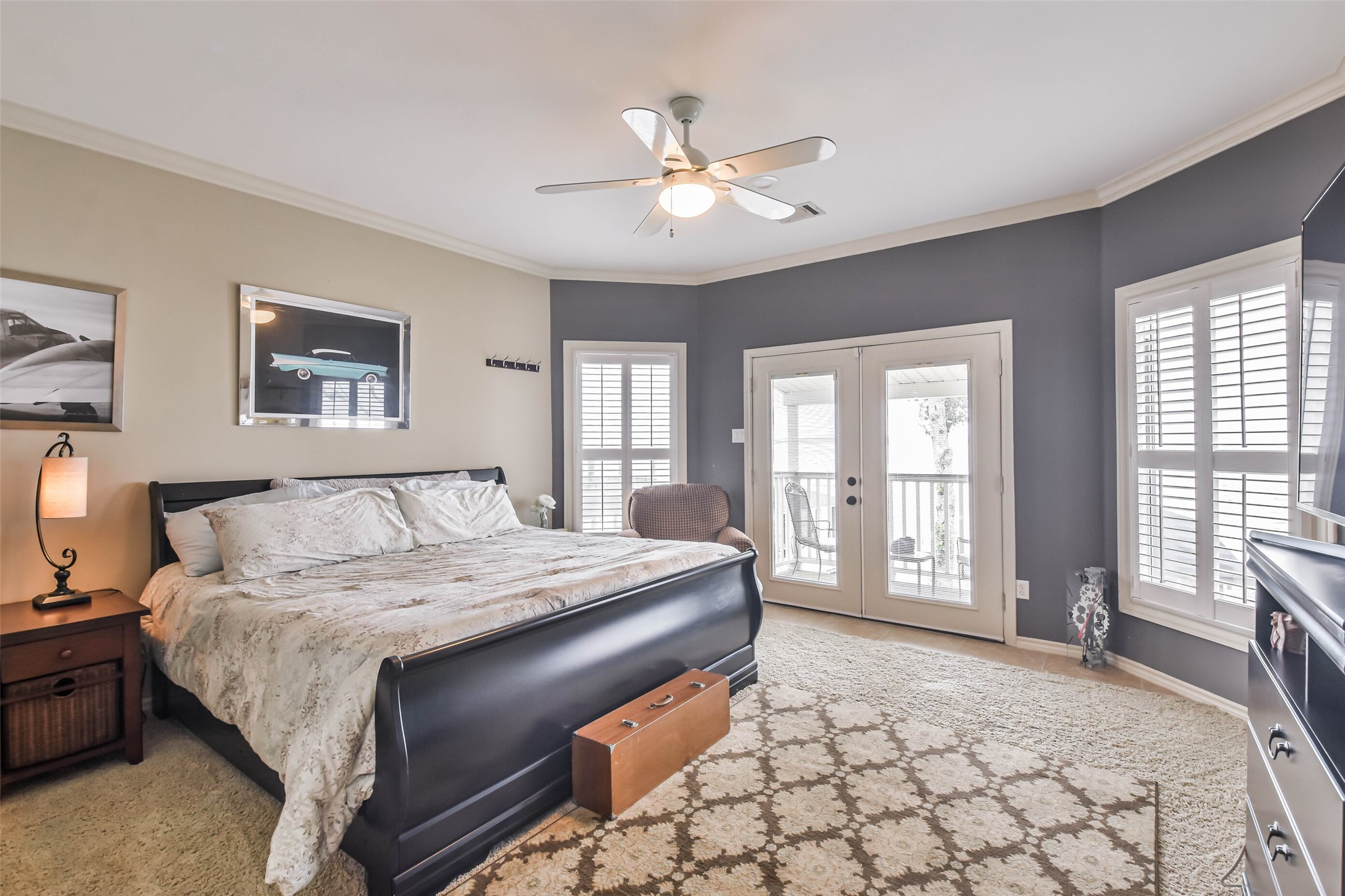 19022 Vantage View Lane Houston, TX 77346 - Photo 31 of 38 a bedroom with a large bed and a window