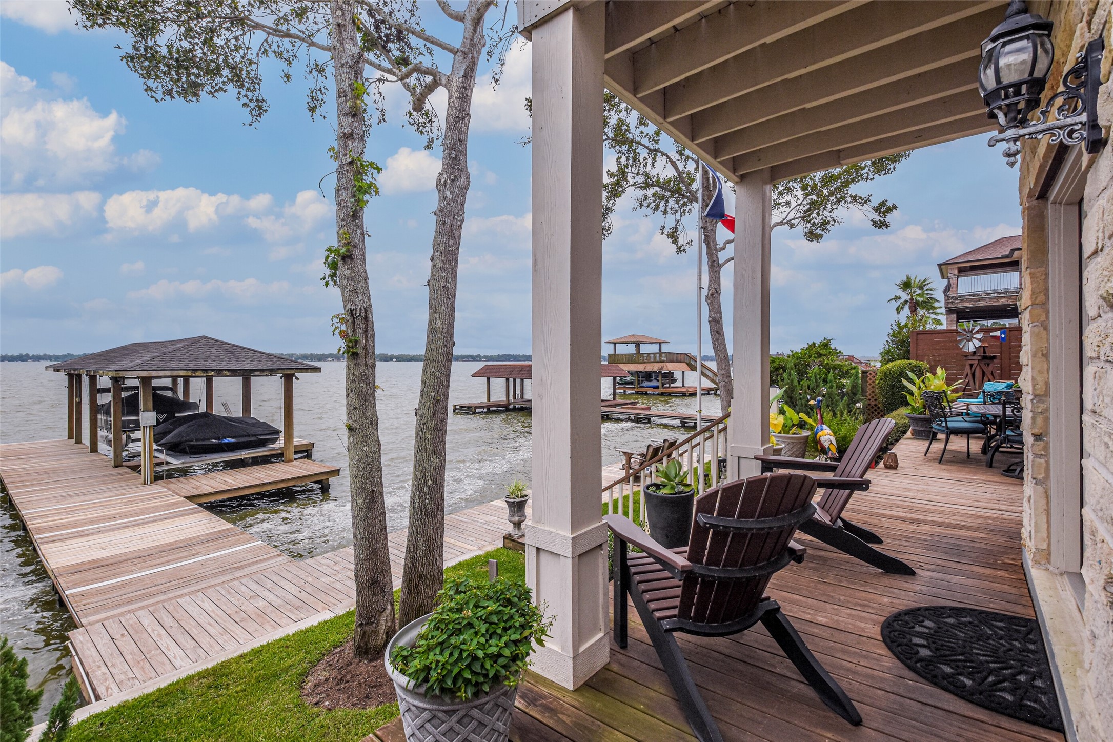 19022 Vantage View Lane Houston, TX 77346 - Photo 36 of 38 a view of a porch with furniture and a yard