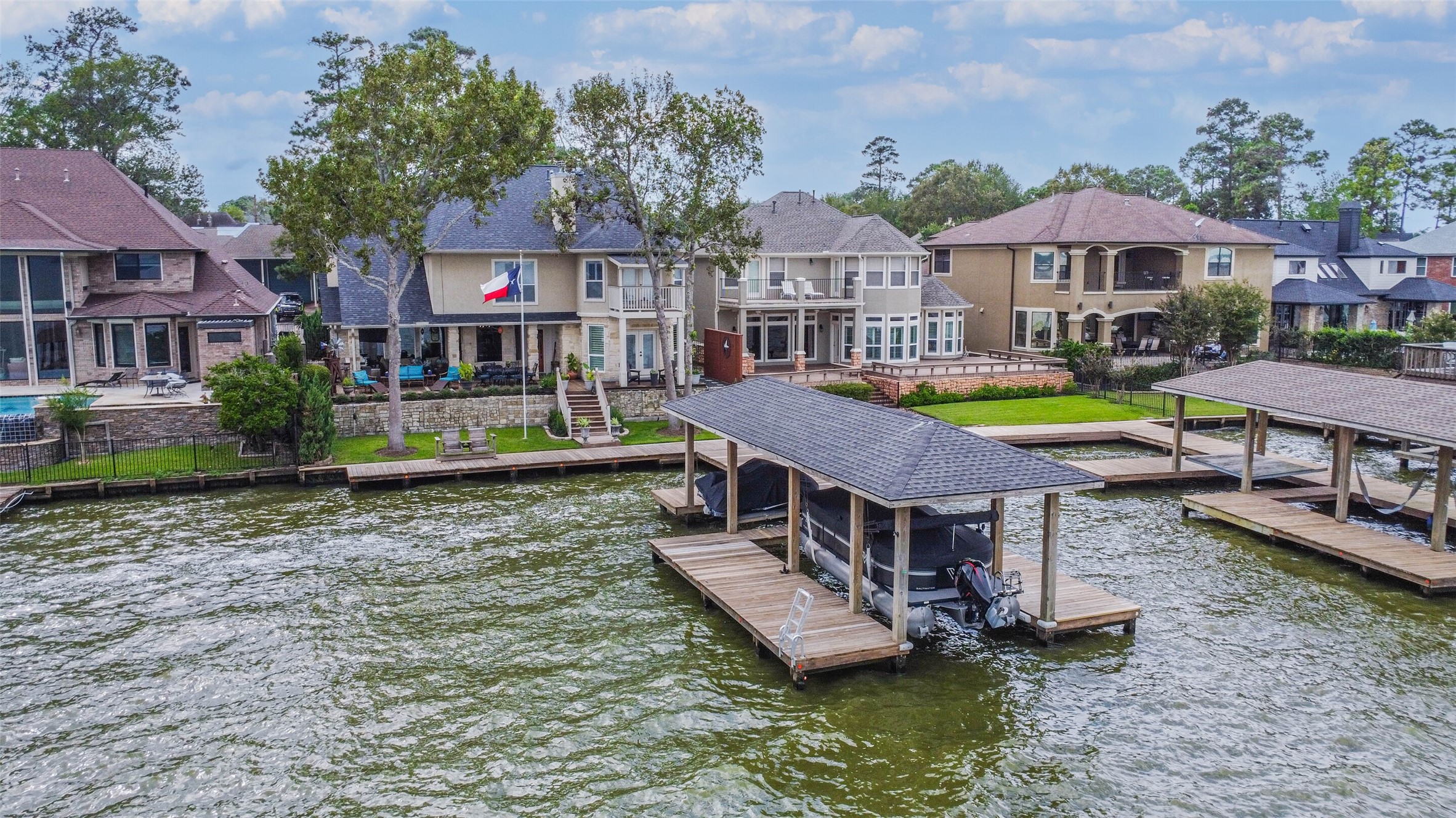 19022 Vantage View Lane Houston, TX 77346 - Photo 4 of 38 an aerial view of a house with swimming pool and a yard