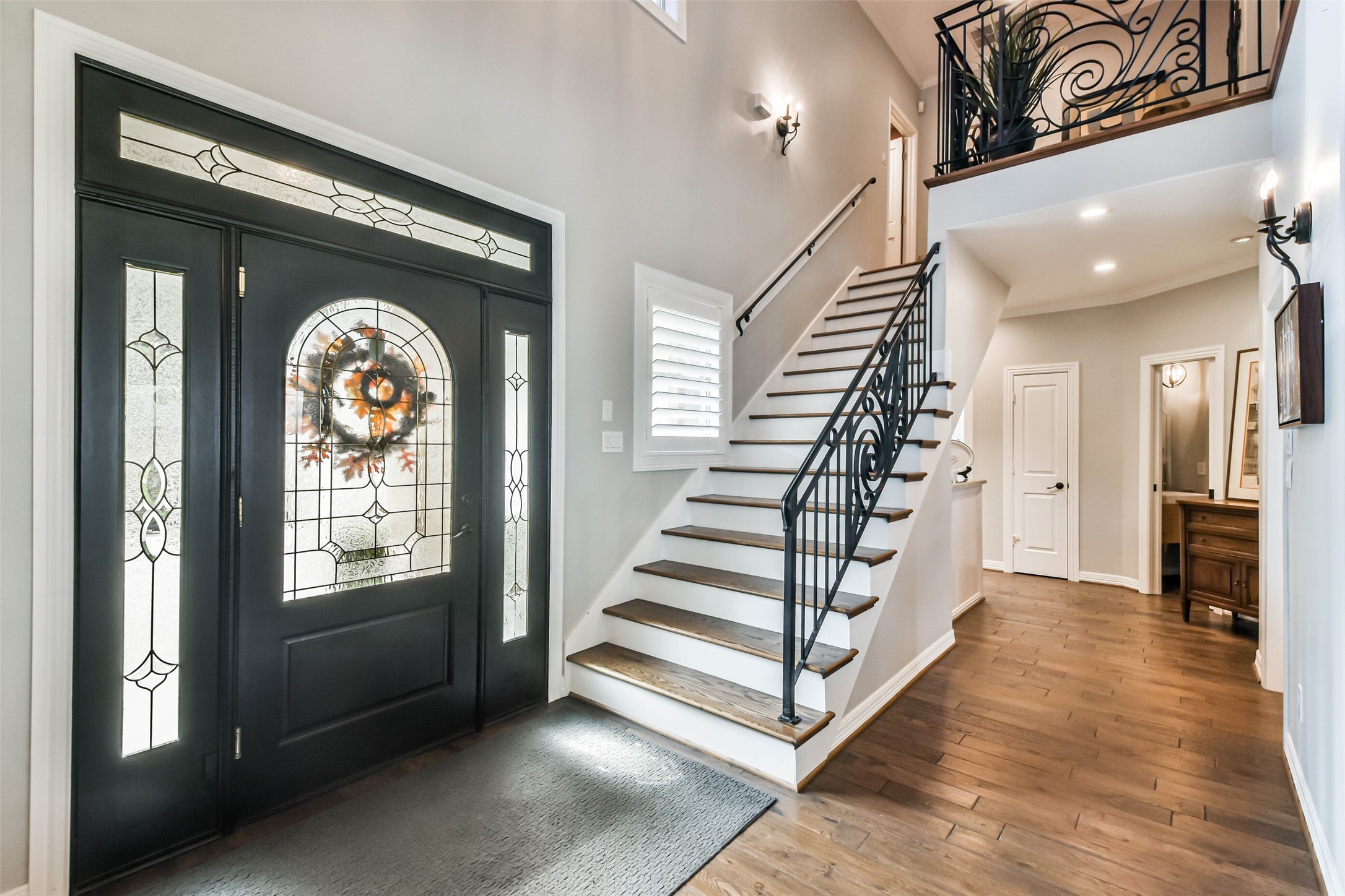 19022 Vantage View Lane Houston, TX 77346 - Photo 6 of 38 a view of entryway with wooden floor and stairs