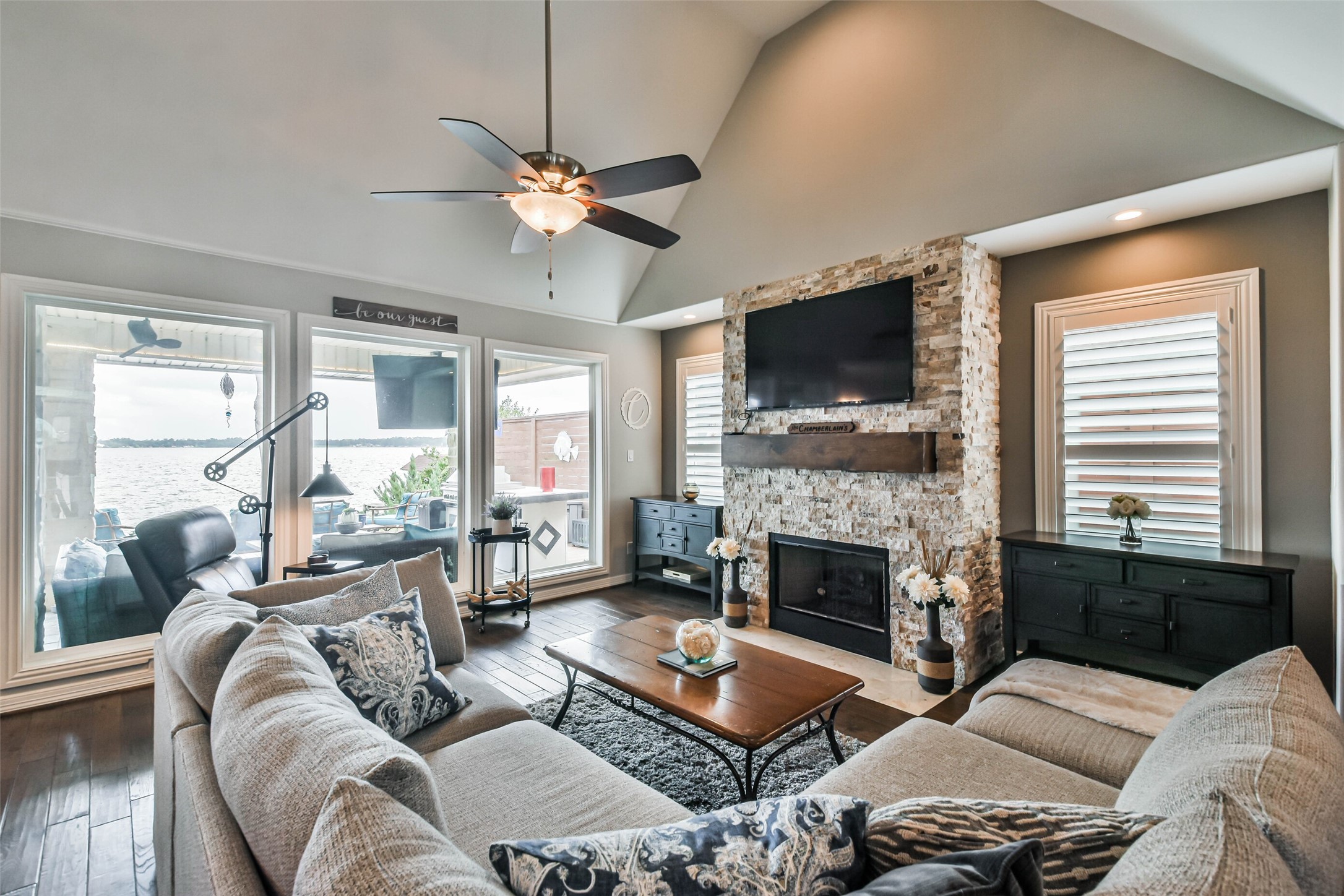 19022 Vantage View Lane Houston, TX 77346 - Photo 9 of 38 a living room with furniture fireplace and a flat screen tv