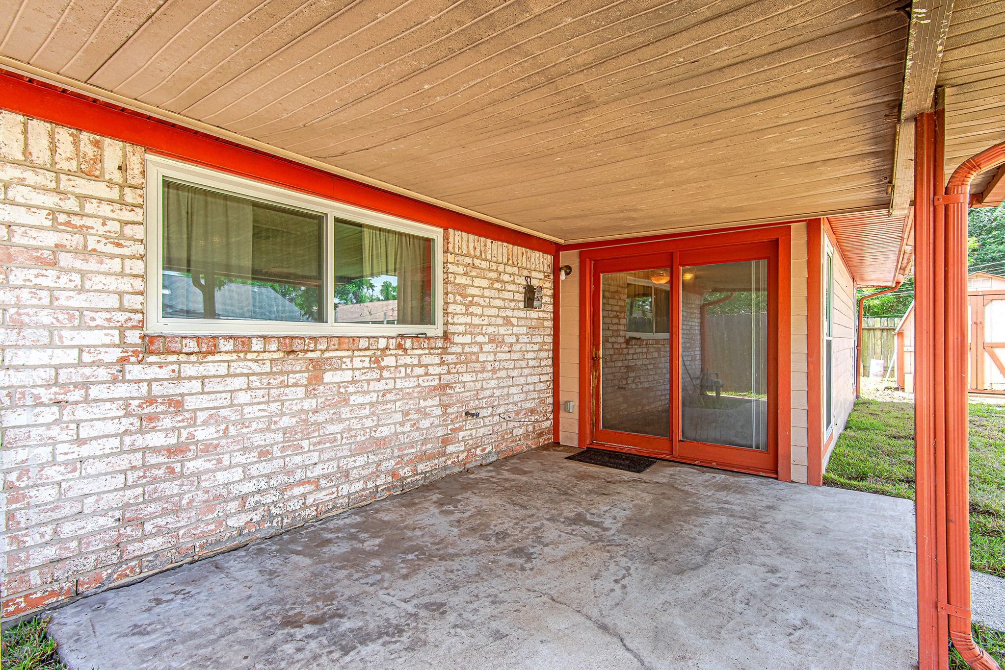 2710 Burke Road Pasadena, TX 77502 - Photo 25 of 28 Covered patio perfect for outdoor dining and relaxation