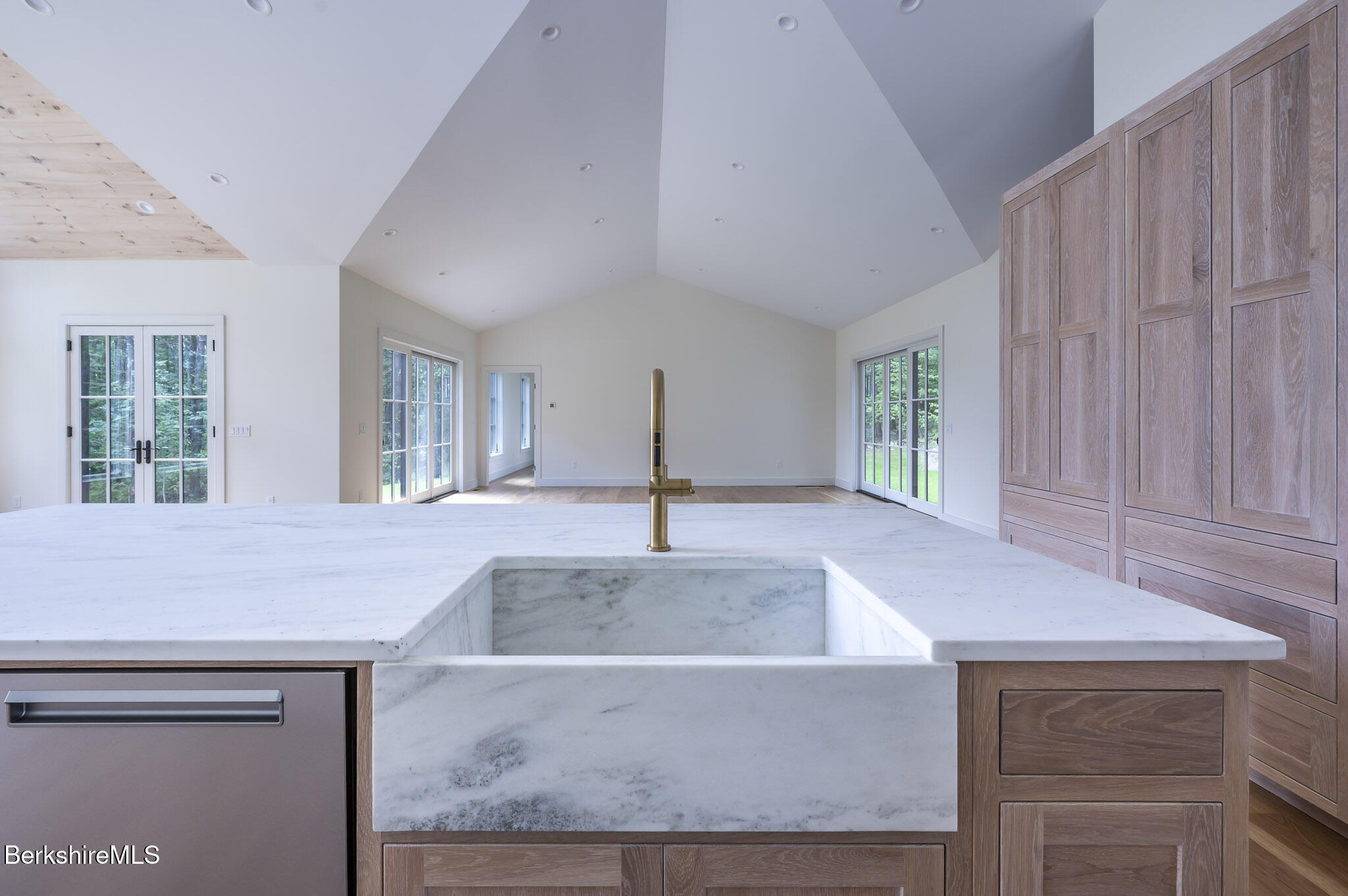 414 South Undermountain Road Sheffield, MA 01257 - Photo 14 of 37 a kitchen with kitchen island a sink and wooden floors