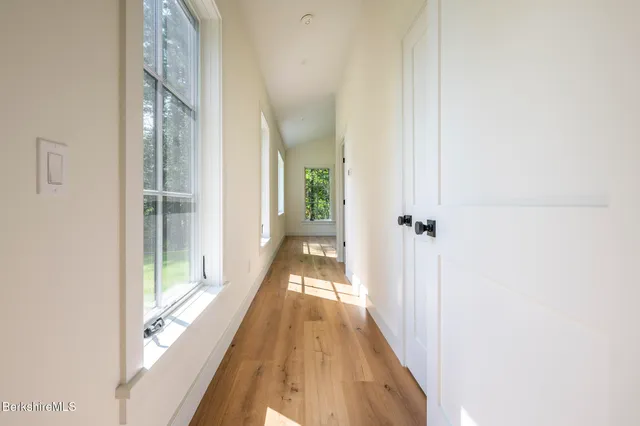 a bathroom with a tub a sink and a shower