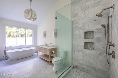 a view of backyard with a garden and plants