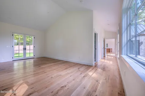 a view of a livingroom with wooden floor