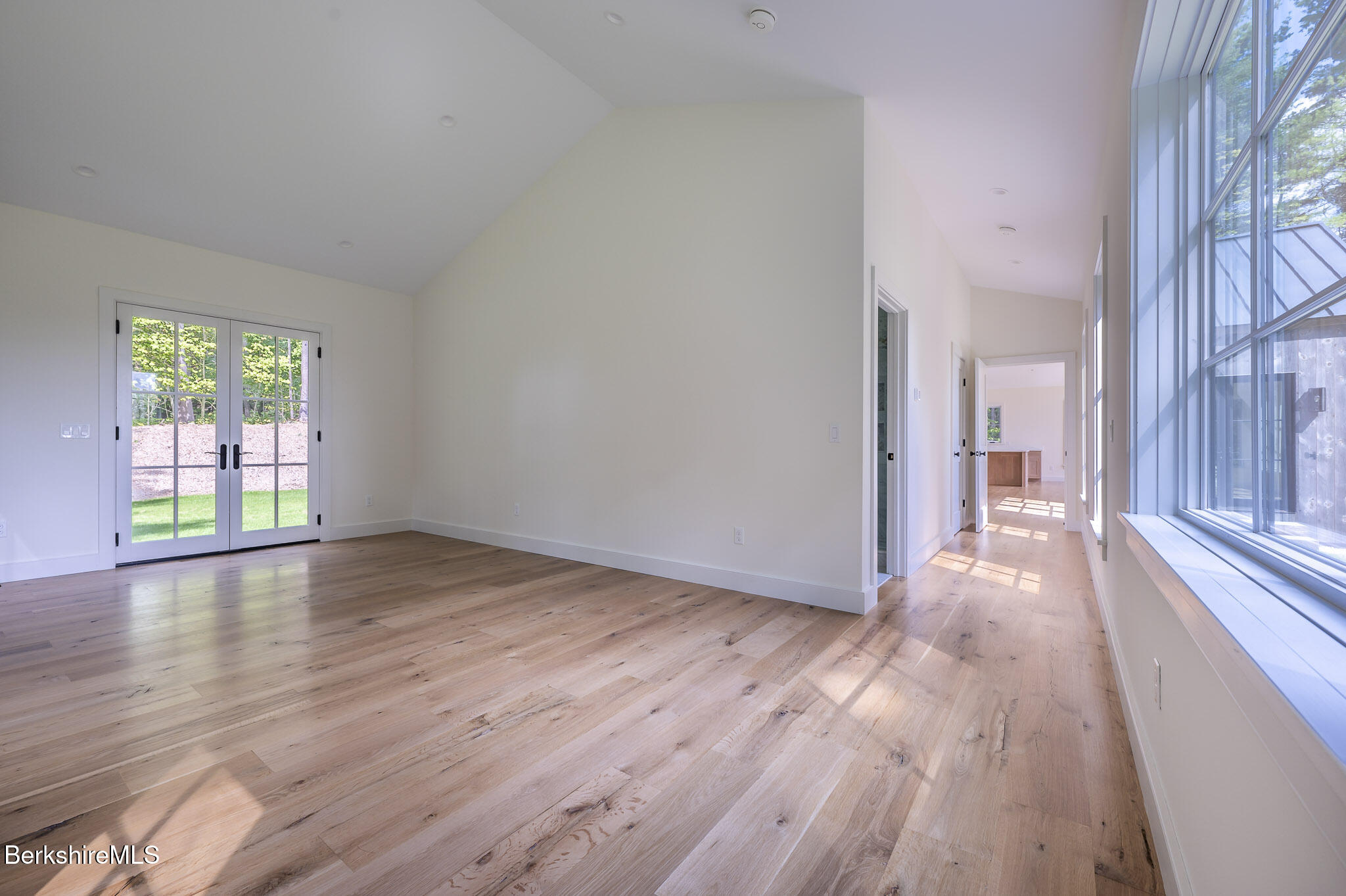 414 South Undermountain Road Sheffield, MA 01257 - Photo 22 of 37 wooden floor in an empty room with a window