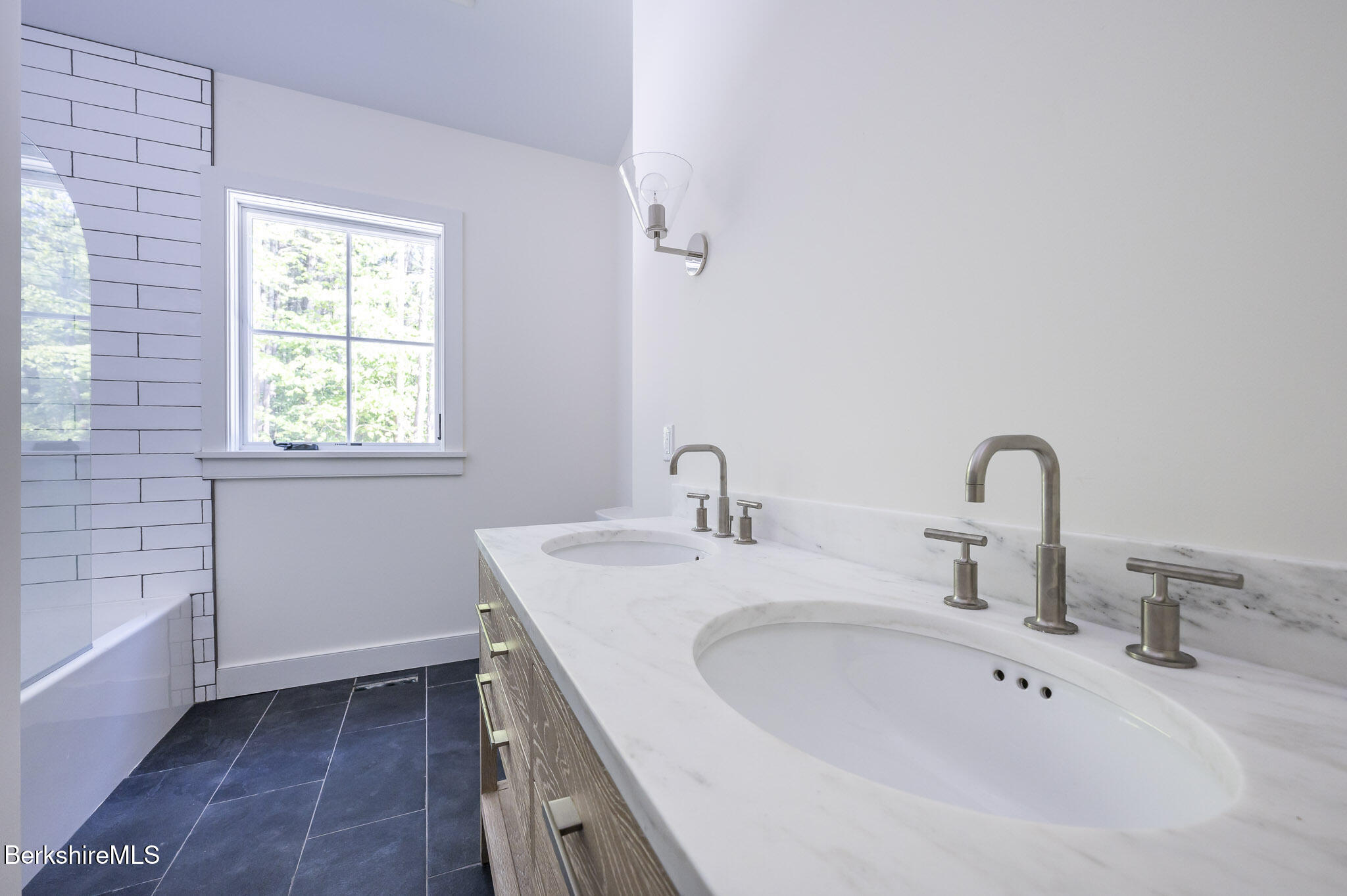 414 South Undermountain Road Sheffield, MA 01257 - Photo 26 of 37 a bathroom with a sink and a bathtub