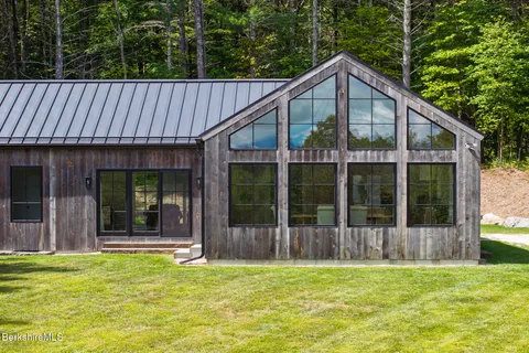 a view of a back yard of the house