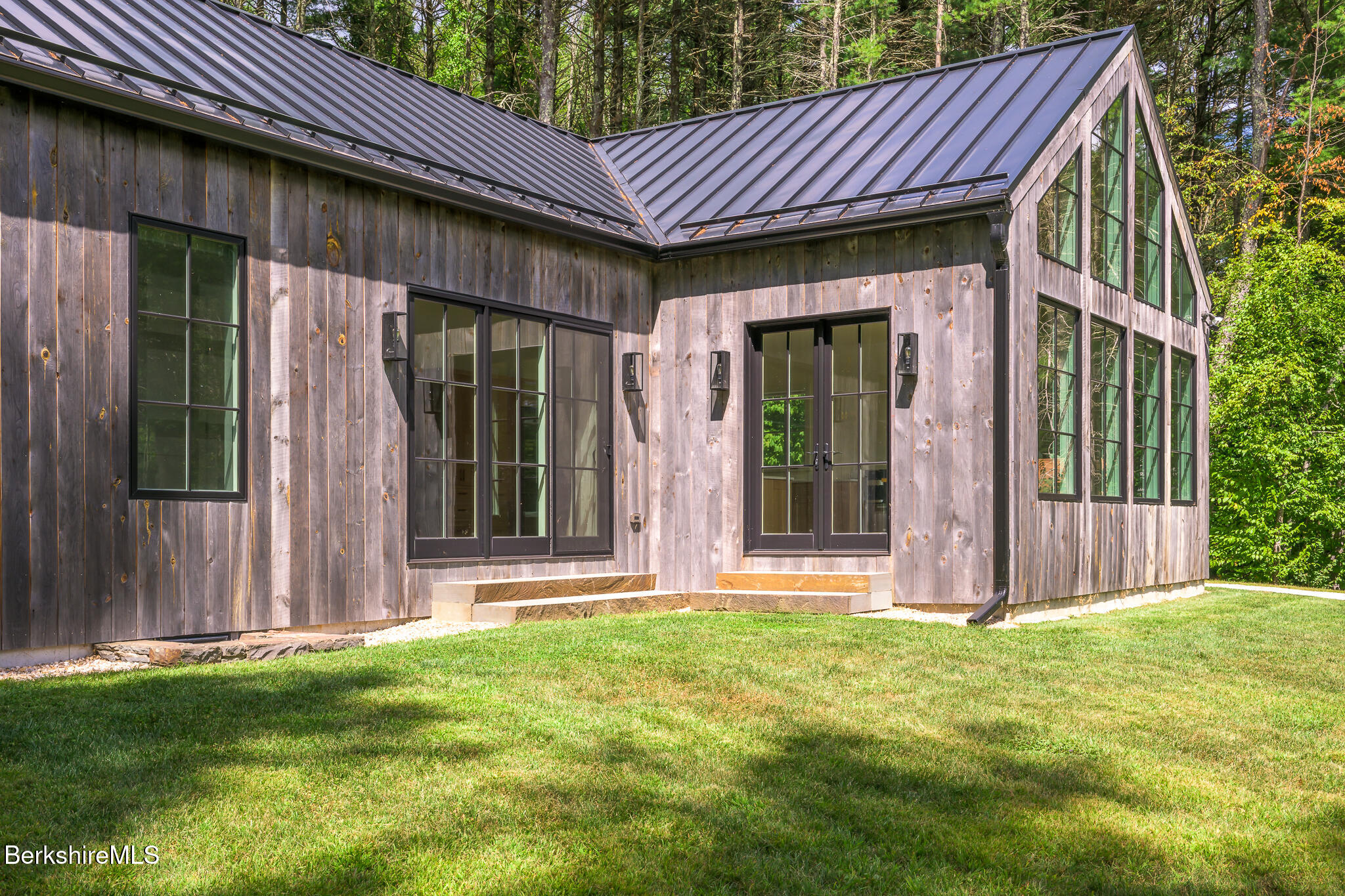 414 South Undermountain Road Sheffield, MA 01257 - Photo 35 of 37 a front view of a house with a garden