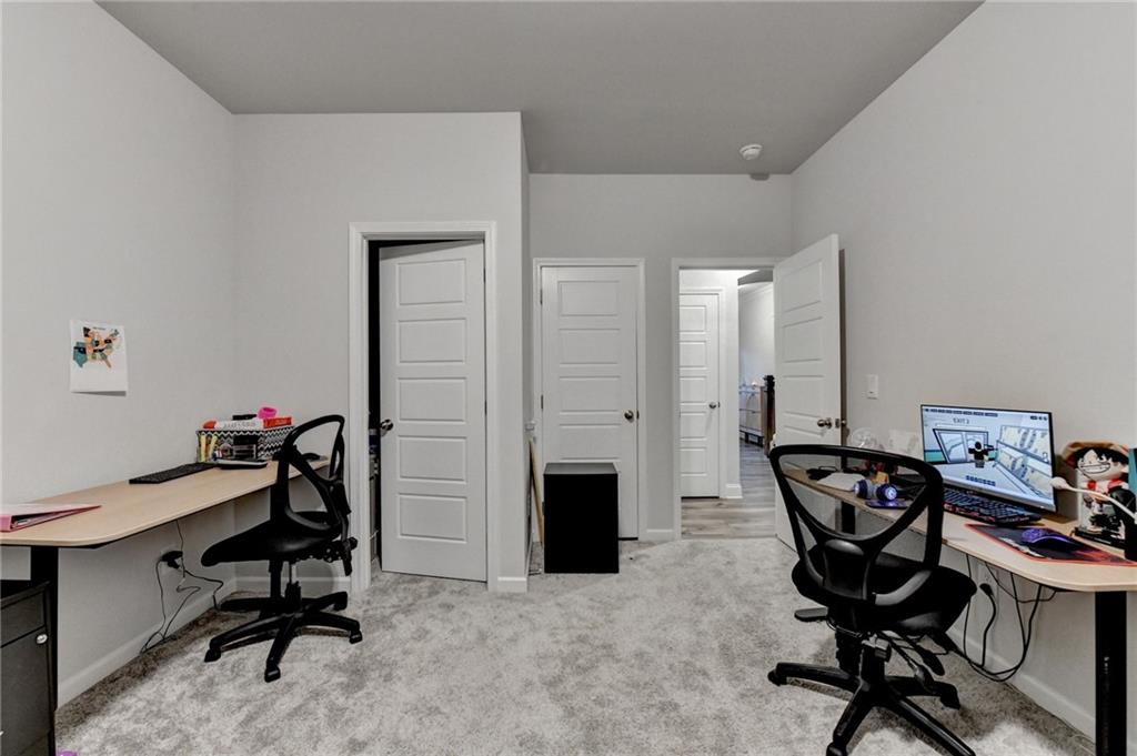 298 Ryston Way Grayson, GA 30017 - Photo 19 of 51 a view of a workspace with furniture
