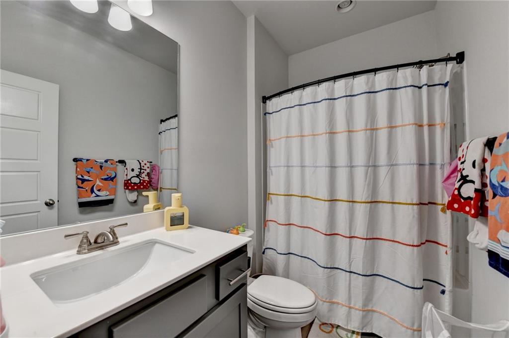 298 Ryston Way Grayson, GA 30017 - Photo 35 of 51 a bathroom with a sink toilet and shower
